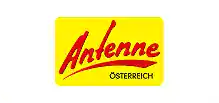Antenne Österreich Logo in leuchtendem Gelb und Rot, symbolisiert regionale Radiosender und Kommunikation in Österreich.