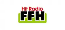 HIT Radio FFH Logo mit grünem Schriftzug und rotem Akzent, symbolisiert beliebtes Radio in Hessen.